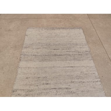 Alfombra artesanal blanca con jaspeado gris 120 x 60 cm