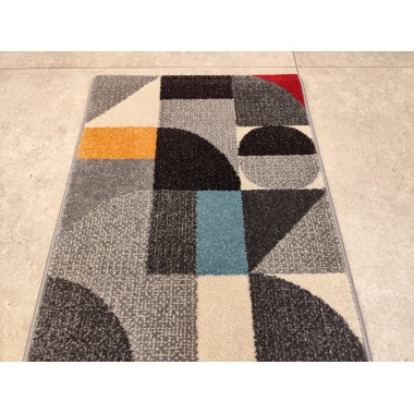 Alfombra geométrica multicolor 110 X 57 cm